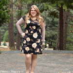 Easy womans dress PDF sewing pattern - woman modeling black floral knit fabric dress with black color-block - DIY Style - Sewing Tutorial
