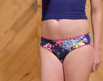 Model wearing low rise panties with a floral print. Sewn using the Feel Frisky Panties sewing pattern by Ellie and Mac sewing patterns. Perfect for beginners and includes projector file, A0 copy shop file, A4 and Letter pattern print file, and full video sew along tutorial. 