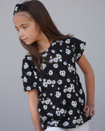 Ellie & Mac kids oversized tee sewing pattern in black daisy print.