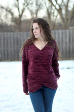 Waist-wrap top sewing pattern with front crossover and curved hem
