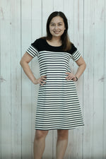 Easy womans knit casual dress sewing pattern - woman modeling white and black striped dress with black color-block - Trendy summer dress - PDF sewing pattern